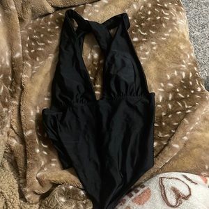Black bodysuit with deep v